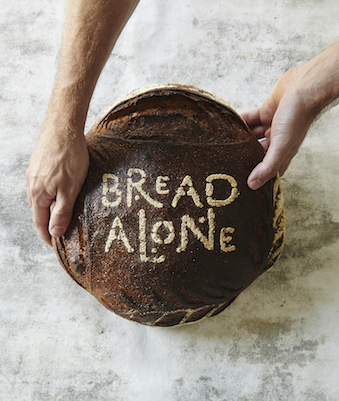 Bread Alone Bakery logo on a round loaf of bread