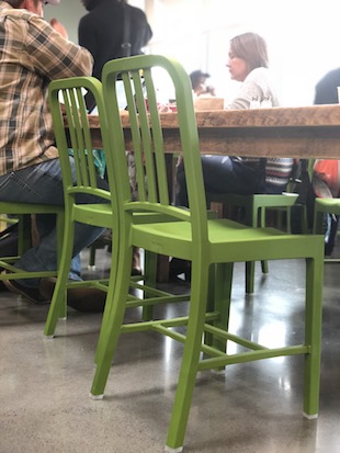 Green chairs in Honest Weight's cafe