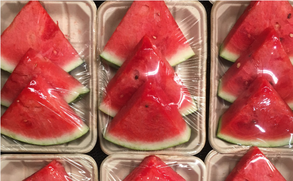 Sliced watermelon in biodegradable packaging