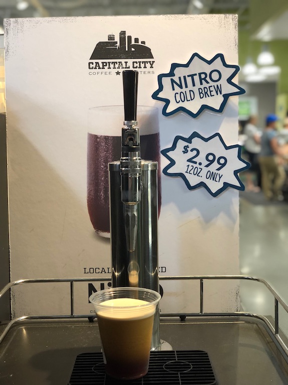 Nitro cold brew tap with price signs